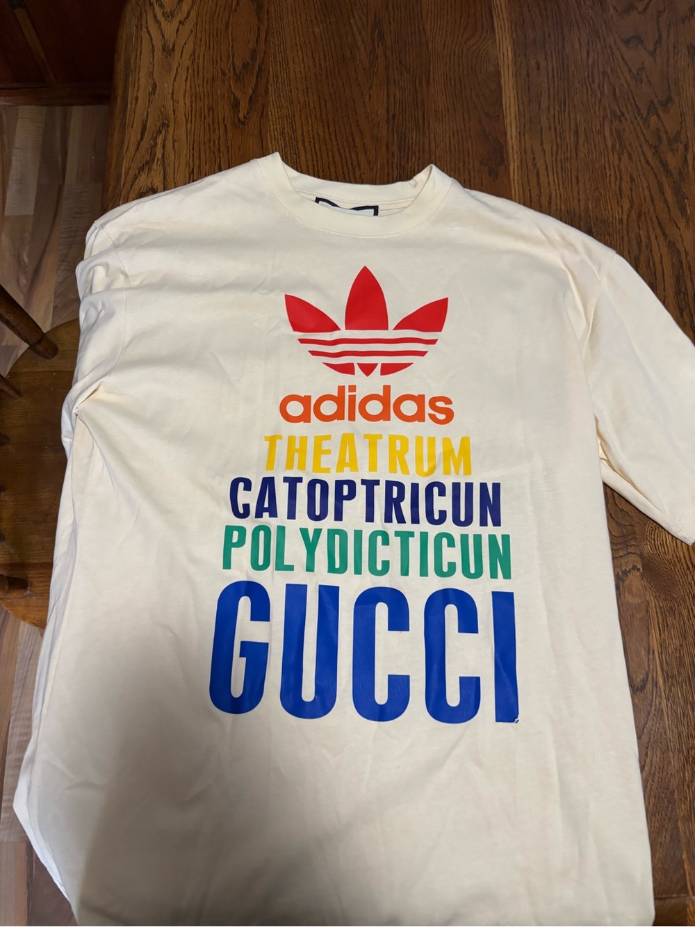 Gucci Cream Long Sleeve Tee with Multicolor Logo Text